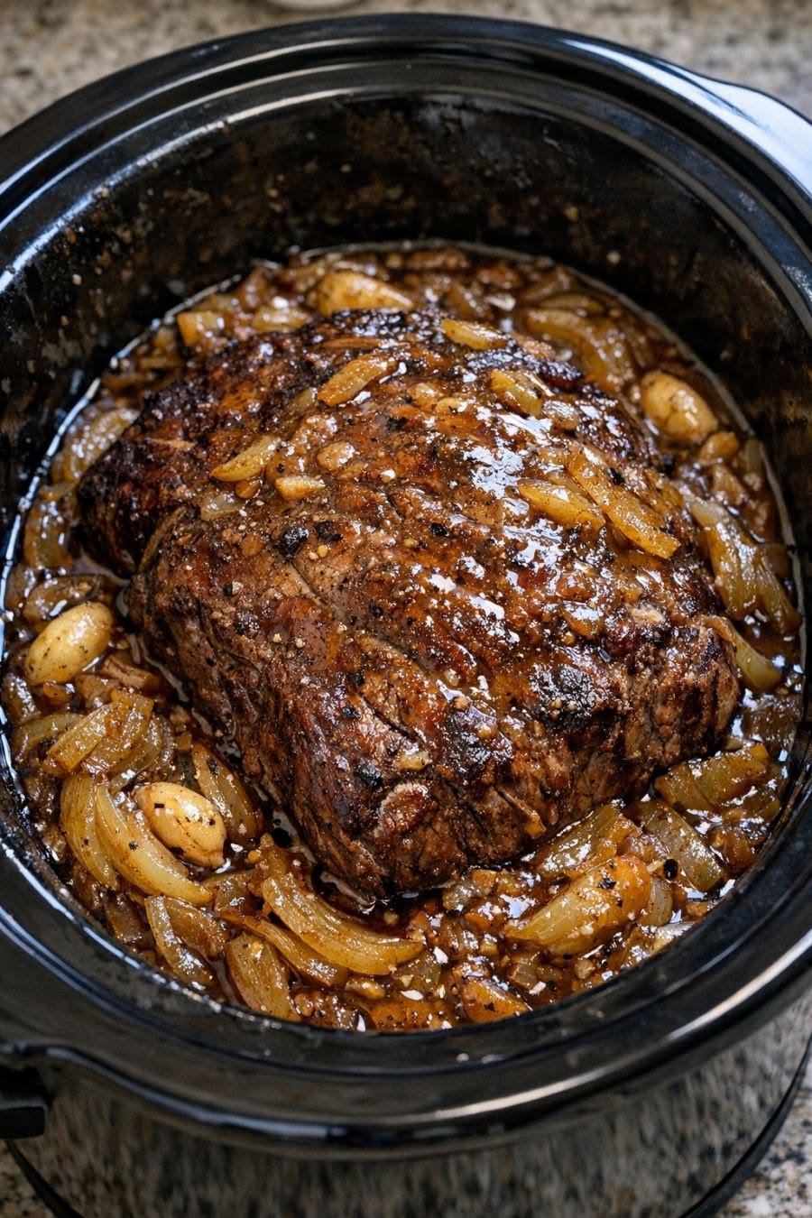 Slow Cooker Garlic Butter Pot Roast with Onions and Gravy